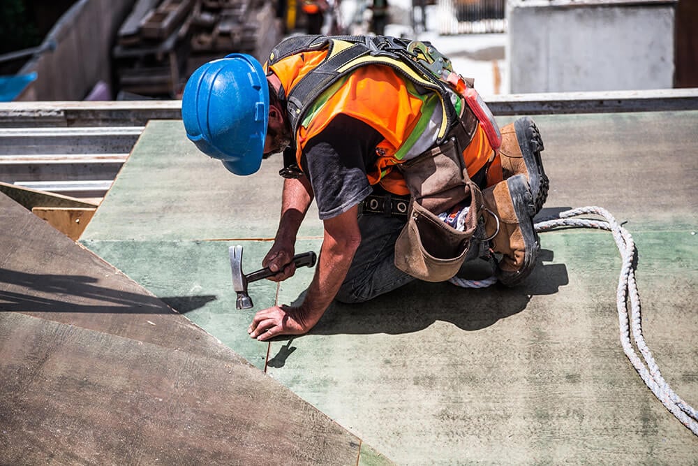 Construction worker using hammer