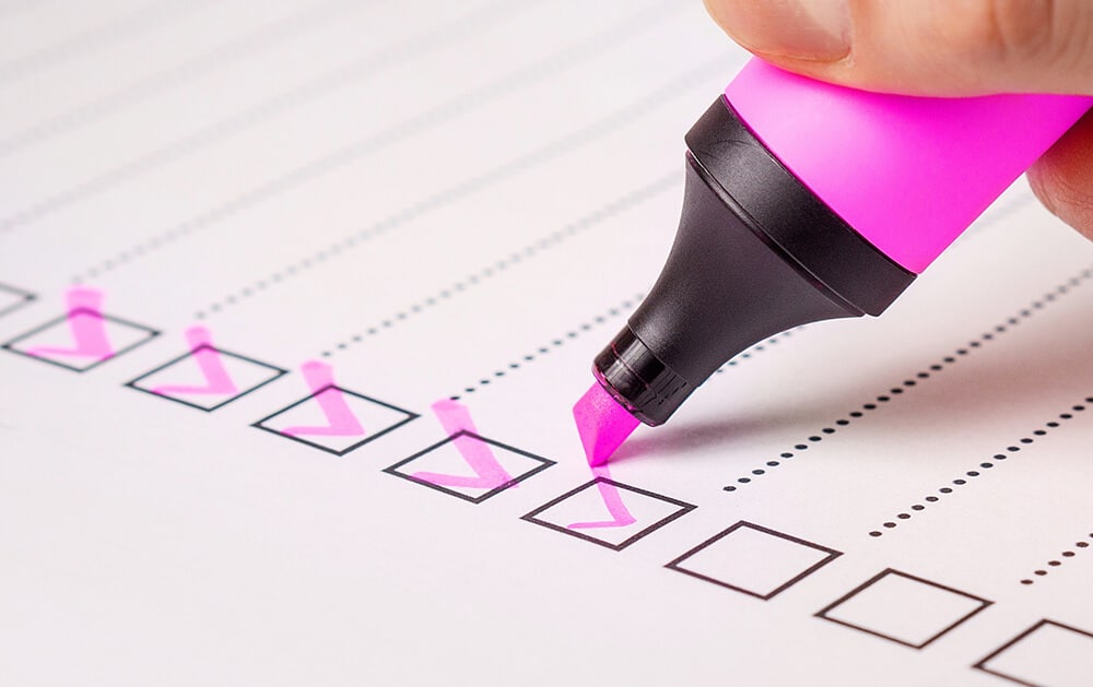 Checklist with pink highlighter